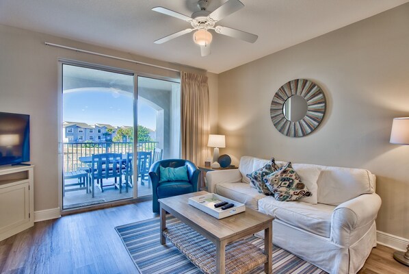 Living Room - Newly updated (2020) 2 bedroom condo at San Remo. New flooring throughout the unit as well as paint.