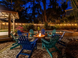 Pool and Firepit by night