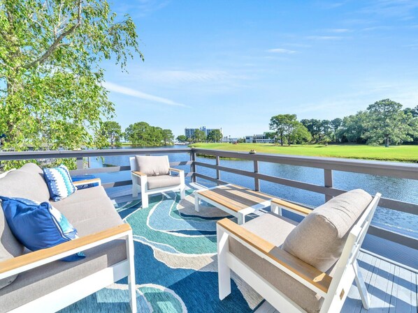 Enjoy Morning Coffee Or Evening Cocktails on The Expansive Deck