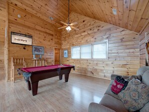 loft’s large game room: pool table, foosball, TV