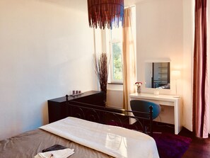 Main bedroom with super king size bed, plenty of storage dressing table, terrace