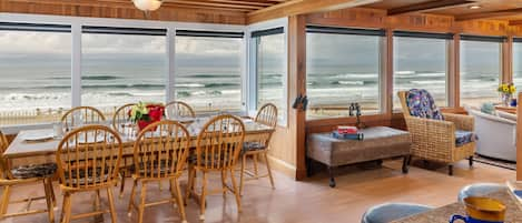 Dining, kitchen and living room are front row to the beach. - Exciting wild surf in the Winter or soothing rolling waves in the Summer.   This house has wall to wall views of the beach and surf.