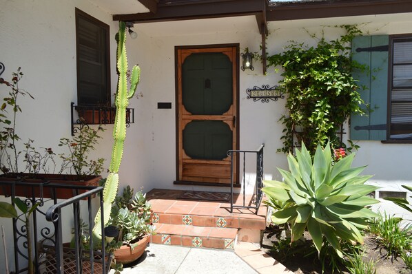 Patios in front & back with free parking & self check-in!