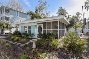 Adorable Fun in the Sun! Great landscaping, screened in porch and puppy dog friendly. Just a few minutes to the beach, you're going to love this enchanting little cottage!