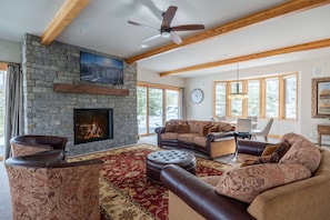 Sink into the plush living room at Eagle Wind Lodge