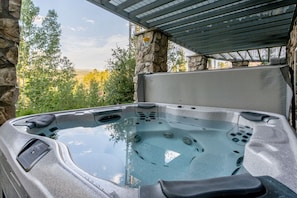 Private hot tub surrounded by nature