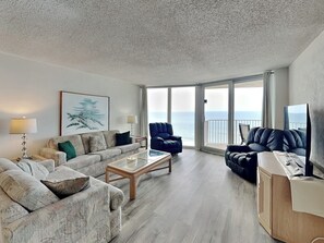 Living Room - Balcony Access, Ocean Views, Sleeper Sofa + TV