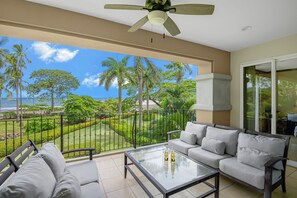 The gentle sound of waves and the soft ocean breeze create a serene atmosphere, making this space ideal for unwinding or entertaining.