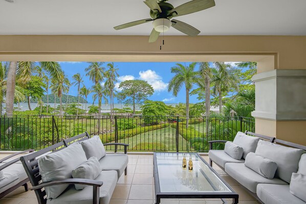 The terrace is furnished with comfortable seating, perfect for relaxing while enjoying the breathtaking views.