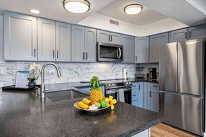 The kitchen has been updated and is well-equipped