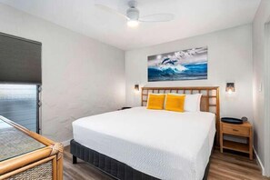 Bedroom featuring Cal-King bed and ceiling fan