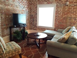 Bright living room with Roku ready TV for streaming your favorite shows
