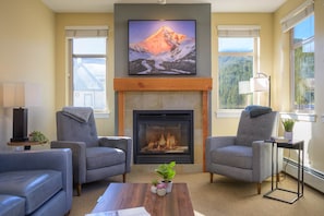 Lounge with gas fireplace and flat screen TV