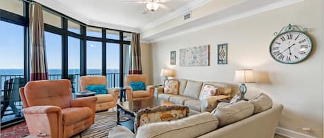 Spacious Living and Dining Areas with floor to ceiling windows reveal a perfect view of paradise.