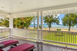 Relax and unwind on this private master suite lanai