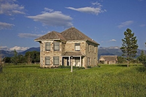 Beautifully restored Stone House and historic Overlook Cabin on an authentic working Montana ranch in the gorgeous Madison Valley south of Ennis.