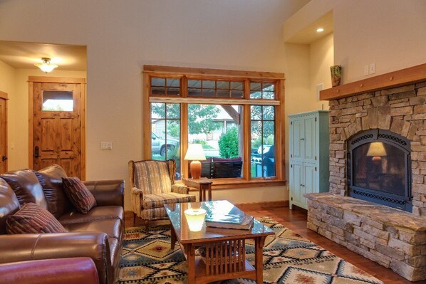 There is a gas-fired stone fireplace, large television, a selection of DVD’s, as well as cable service.