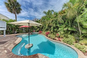 Enjoy the all-day sun in this stunning professionally landscaped private backyard