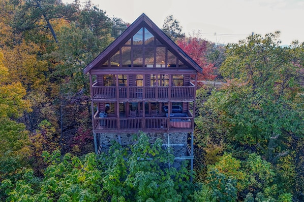 Evening View - Beautiful view of this gorgeous cabin. The cabin is surrounded by the Great Smoky Mountains.