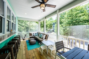 Outside | Screened Porch - Set your worries free in this beautifully designed screened in patio just off of the kitchen.