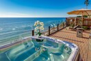Soak in the Hot Tub and Relax by the Sea
