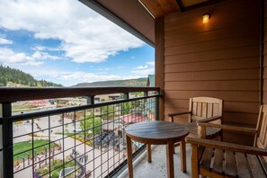 Enjoy a serene cup of coffee from the private deck overlooking the base area