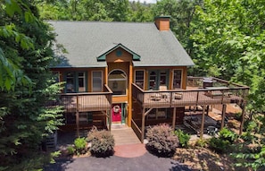 Front of House: No stairs from parking into the Ground Level. Ground level has Game Room, Multi-Bed Room, Jack-N-Jill Full Bath and Queen Bedroom Suite with private Bath.