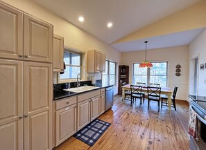 Kitchen and Dining Area - open, bright and homey!