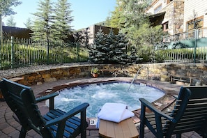 Relax in one of the bubbling hot tubs at Zephyr Mountain Lodge