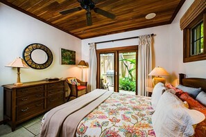 With an elegant style and decoration, the master bedroom has a queen size bed.