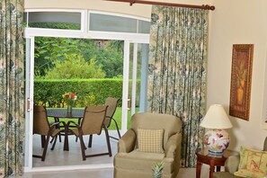 Outdoor dining area and view of the golf course.