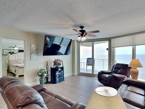 Living Room - Balcony Access, Ocean Views + TV