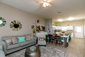 Thoughtfully designed open layout combining the living, kitchen, and dining areas for easy entertaining