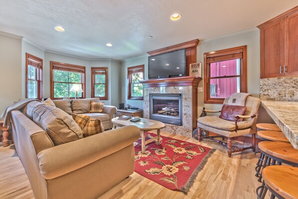 Living Room with Gas Fireplace, Large Smart TV, DVD, Queen Sectional Sofa Sleeper, and Historic Park City Views