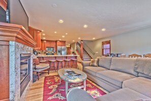 Second Level Great Room with Full Bath Access and Stairs to Third Level Master Suite
