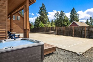 Evergreen Lodge. - Private hot tub with pickleball court in the background!