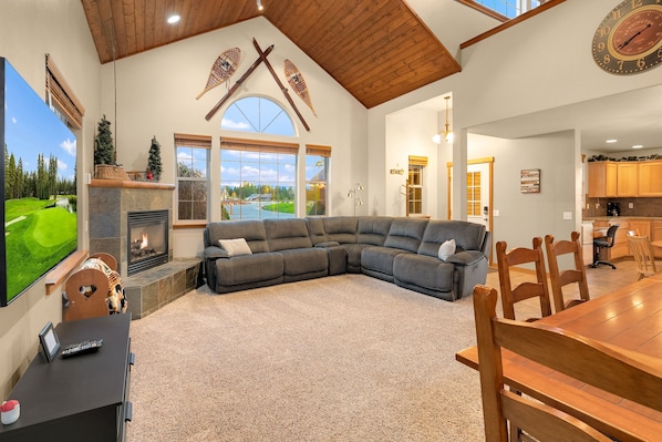 Evergreen Lodge & Studio Apartment: - Great room with a large smart TV, gas fireplace, and comfortable couches.