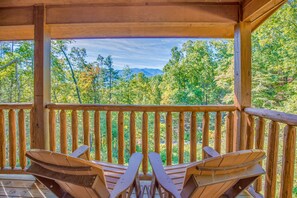 Rocky Top Lookout’s Two covered decks offer spectacular views of the Smoky Mountains