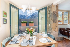 Dining area (seating for 6) with French doors opening to your rooftop veranda.