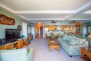 Furnished and decorated in a cool tropical palette