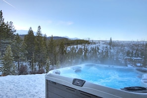 Soothe your achy muscles after a day on the slopes in your own private outdoor hot tub!