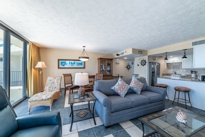 The great room and kitchen both have expansive views of the Gulf of Mexico