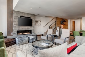 Spacious Living Room with a Gas Fireplace and a 55" Smart TV