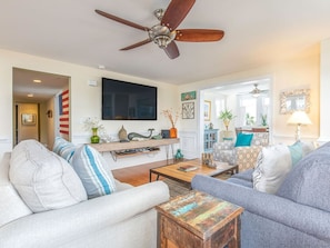 Living Area with  Sleeper Sofa and Large Flat Screen TV