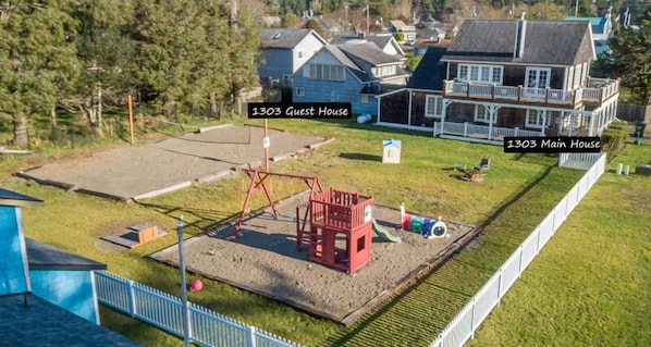 1303 Beach Retreat aeriel view of the yard and houses
