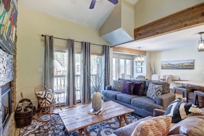 Living Area - Watch skiers on the slopes from the private deck - 4 O’Clock Lodge D26 Breckenridge Vacation Rental