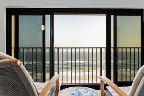 Gulf Front Balcony - Enjoy sweeping views and the soothing sounds of the Gulf from the enclosed Gulf-front balcony.