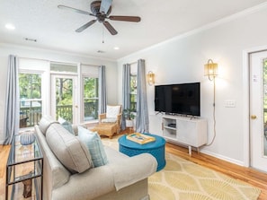 Living area with Queen-size sleeper sofa and flat-screen TV