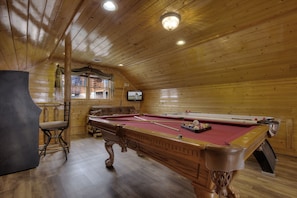 Loft game room - Loft features premium billiards table and standup arcade game