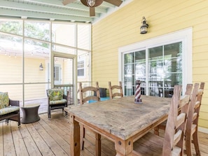 Screened porch with dining table for 6